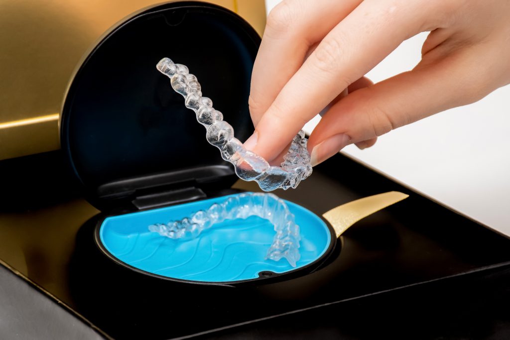 Choosing the Right Path to a Straighter Smile: Invisalign vs. Traditional Braces